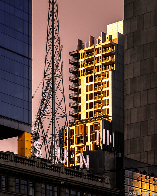 Splashes of gold, courtesy of the setting sun - Flinders Street - Melbourne